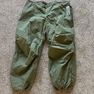 New with tags urban parachute pants.  Army green. Never worn.